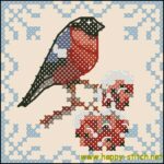 Bullfinch on a brach of rowan free cross stitch pattern